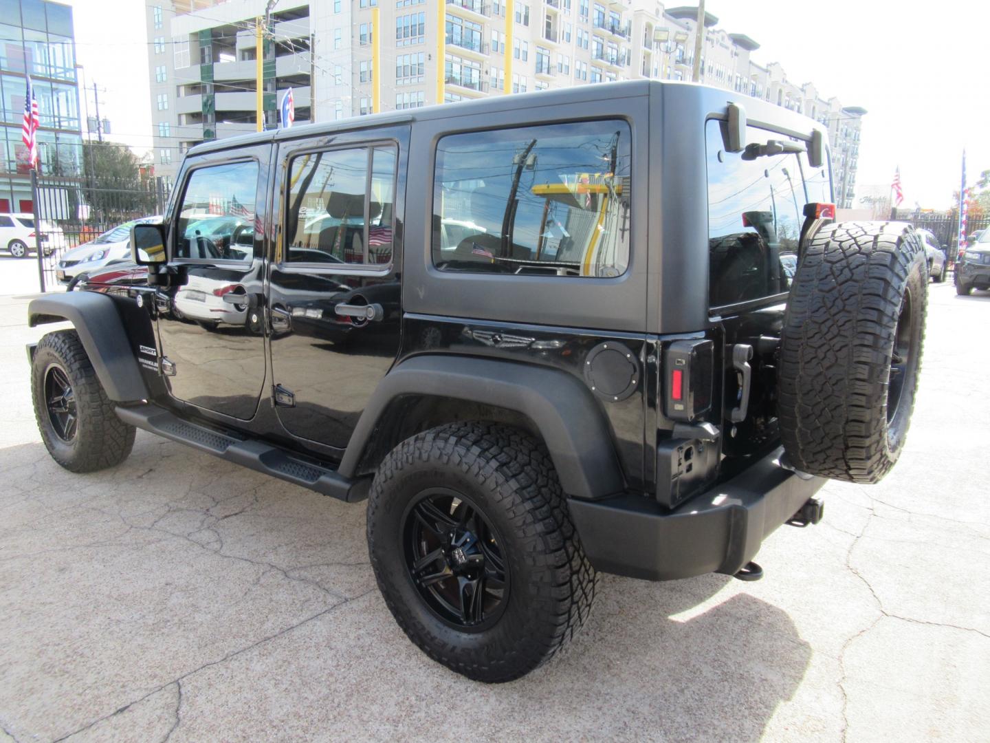 2017 Black /Black Jeep Wrangler UNLIMITED SPORT (1C4BJWDG1HL) with an 3.6L V6 F DOHC 24V engine, Automatic transmission, located at 1511 North Shepherd Dr., Houston, TX, 77008, (281) 657-1221, 29.798361, -95.412560 - 2017 JEEP WRANGLER UNLIMITED SPORT VIN: 1C4BJWDG1HL517754 1 C 4 B J W D G 1 H L 5 1 7 7 5 4 4 DOOR WAGON/SPORT UTILITY 3.6L V6 F DOHC 24V GASOLINE REAR WHEEL DRIVE W/ 4X4 - Photo#32